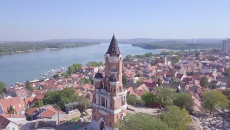 tilting establishing aerial shot of gardos tower in zemun old city