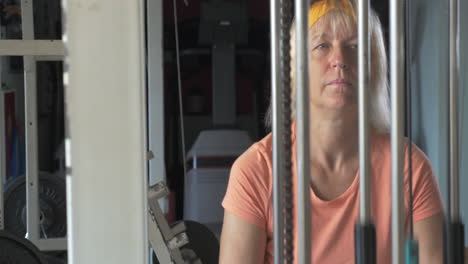 Senior-woman-working-out-on-exerciser