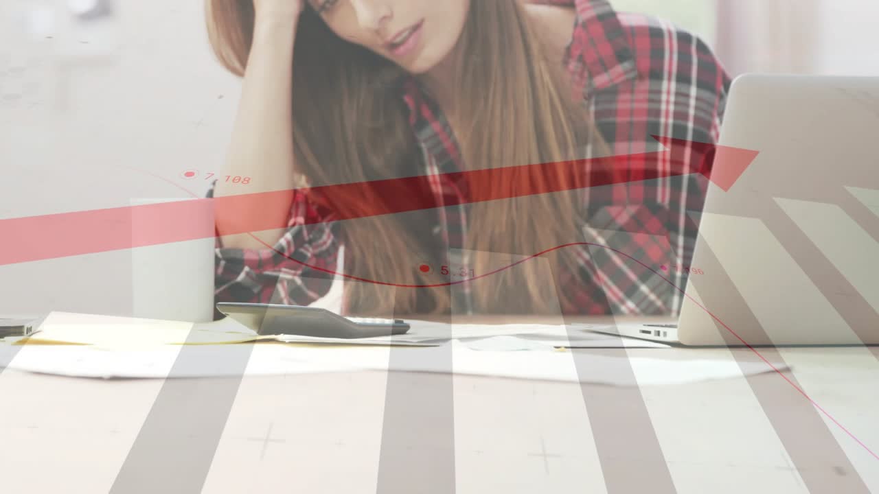 Woman starting work at desk reviewing docs and laptop for business, red stripe overlay showing data