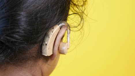 hearing aid on a woman's ear