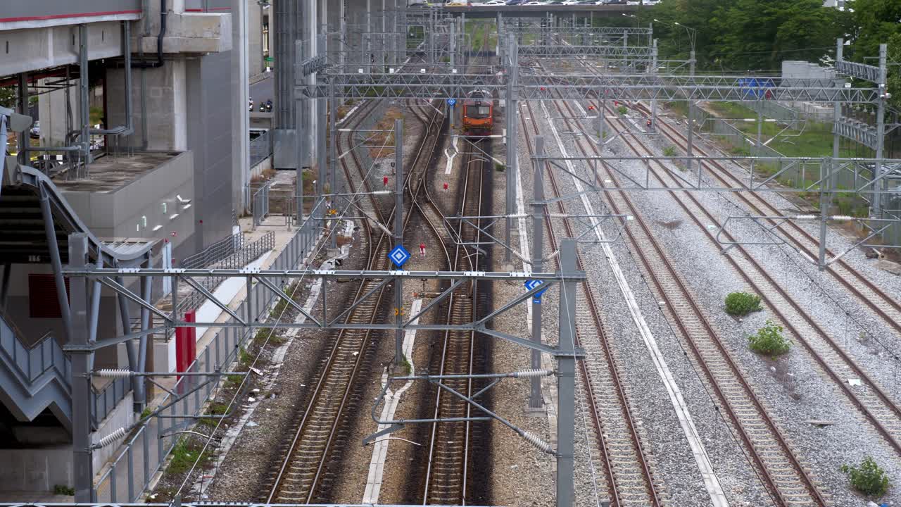 View from the top of a cargo train arriving at Bang Sue train station in Bangkok, Thailand