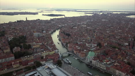 wide aerial shot of venice and chiesa di san simeone piccolo from above at dusk