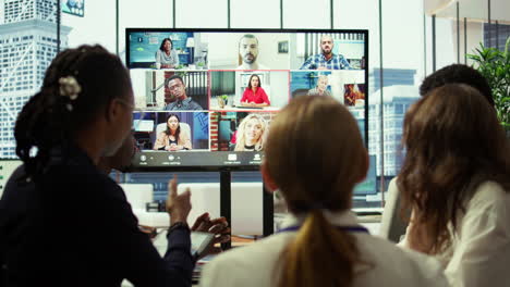 marketing team analyzing big data insights on online videoconference