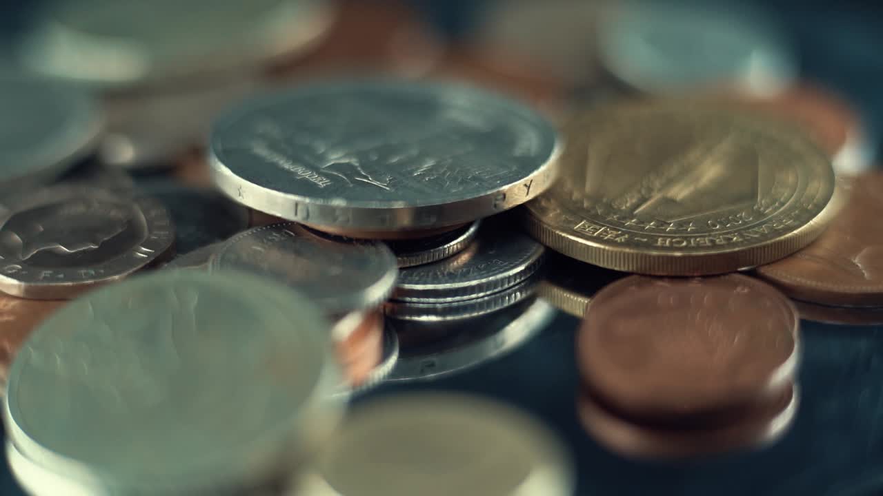 Macro video of vintage rare coins, retro money edition, old gold, on a 360 rotating plate, 120 fps slow motion, gold metal bronze silver, studio lighting
