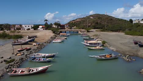 docking boats on shore of canal at zaragoza beach on isla de margarita, venezuela