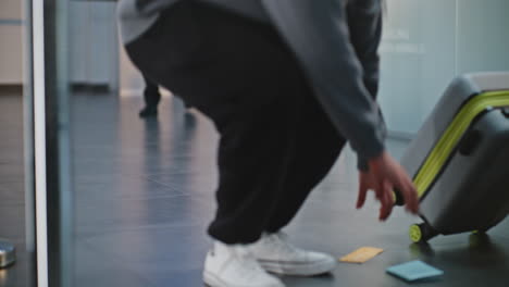 people walking in a modern building corridor