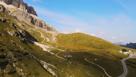 aerial view of picturesque val gardena, green hills and valley under blue summer sky, dolomites, italy