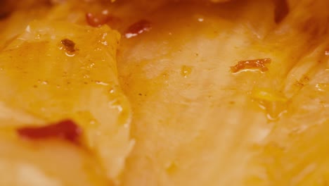 close-up of texture fermented spicy cabbage kimchi with in can. preservation of vegetables in glass jars. fermentation preserved kimchi cabbage with spices macro. asian cuisine.