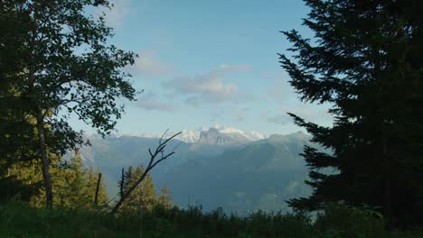 A-cyclist-pedals-up-a-ridge-with-Mt-Blanc-in-the-background