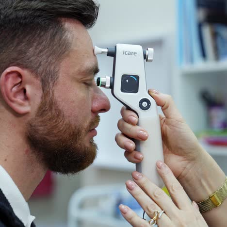 doctor examining eyesight of patient