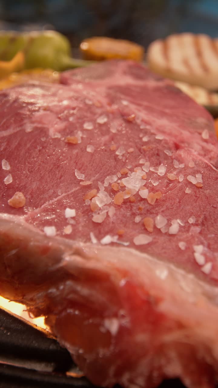 Steak with Salt on a Grill