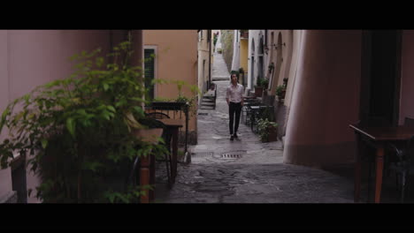 man walking in a charming italian alley