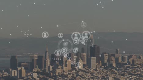 Animation-of-network-of-connections-with-icons-over-cityscape