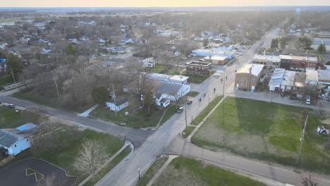 aerial-of-Chillicothe,-Illinois,-and-a-group-of-motorcyclists-out-for-a-Spring-ride