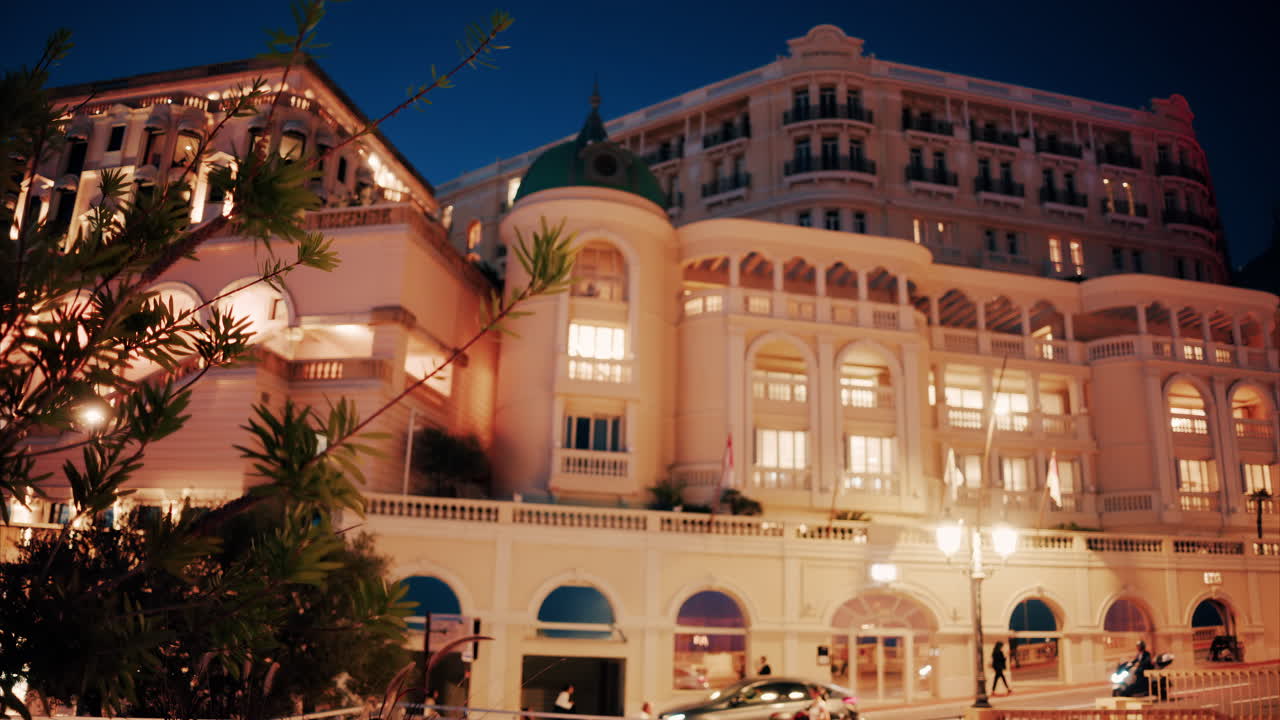 Monte Carlo, Monaco - October 14, 2024: The facade of Hotel de Paris in the evening