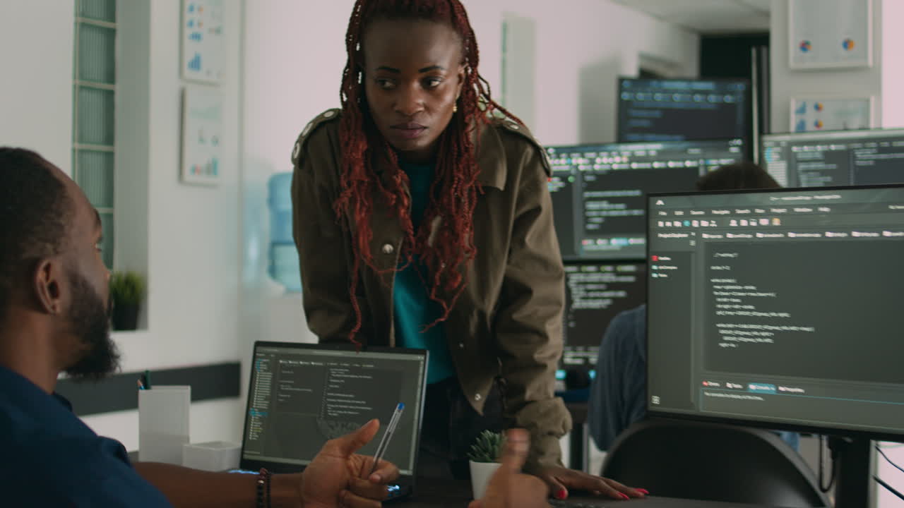 Software engineers brainstorming ideas to develop it code on computer