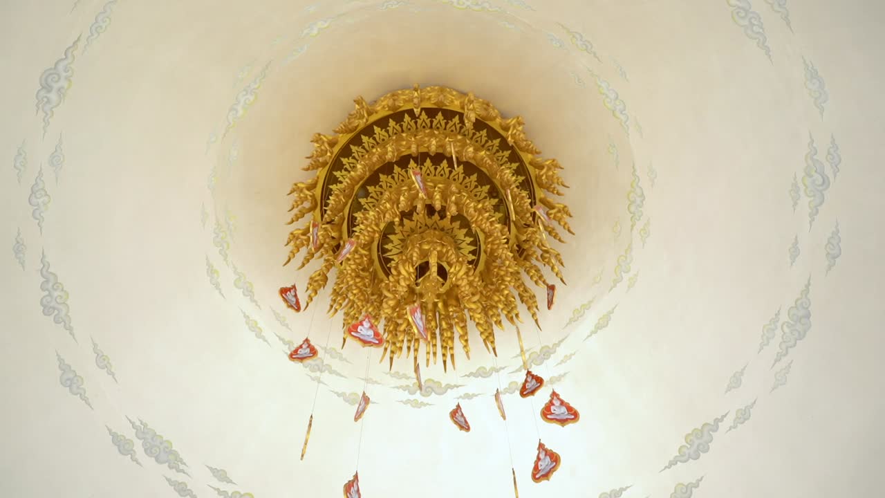 Beautiful golden Chandelier at White Temple in Chiang Rai, Thailand.