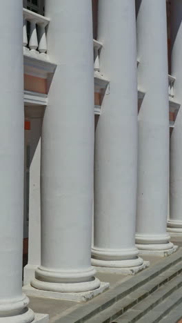 people on column building. aerial drone view of column building. vertical video
