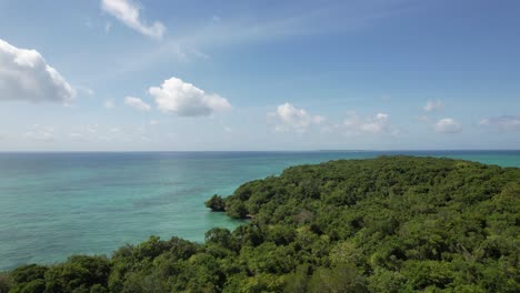 Drone-Despega-De-Un-Barco-En-La-Laguna-Azul,-Zanzíbar