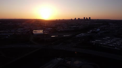 Flying-Over-Calgary's-Industrial-Area-During-Golden-Hour