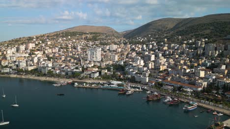 saranda, albania - cinematic aerial drone shot on summer day