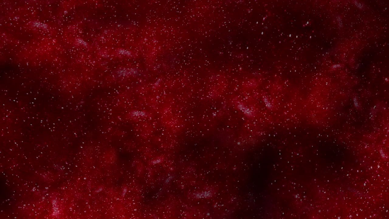 Shimmering scarlet particles close-up of red substance