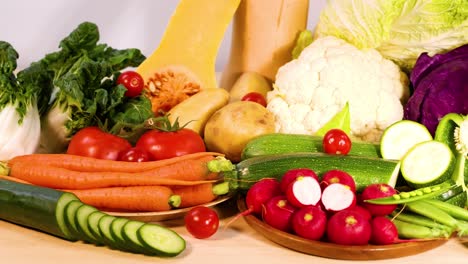 assorted vegetables displayed on a white background