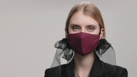 portrait of female model in stylish face mask