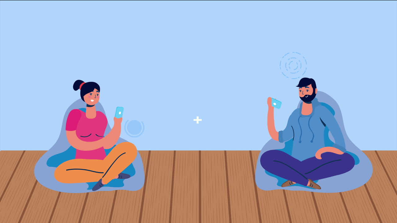 소파에서 스마트폰을 사용하는 커플