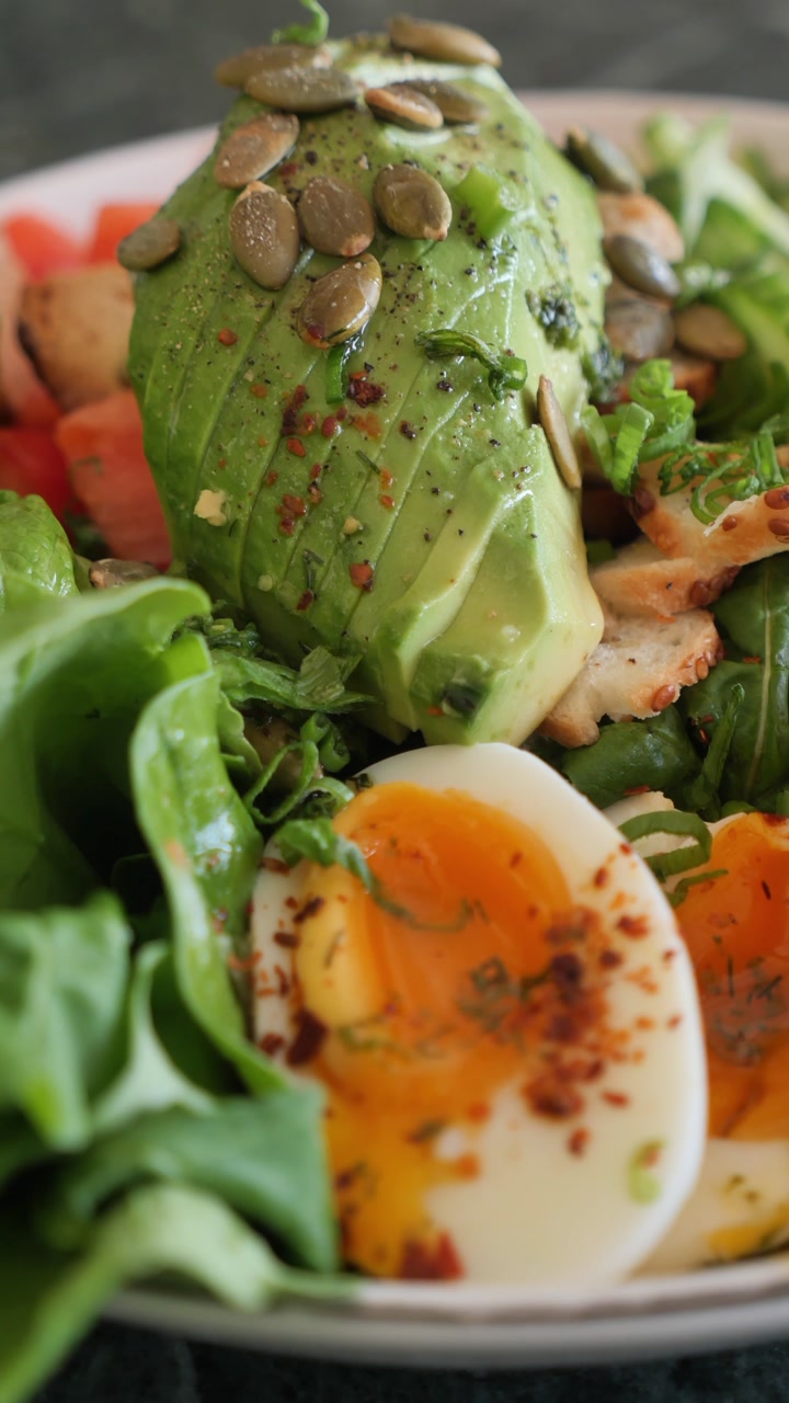 Vibrant Healthy Salad with Avocado, Soft-Boiled Eggs, and Fresh Greens