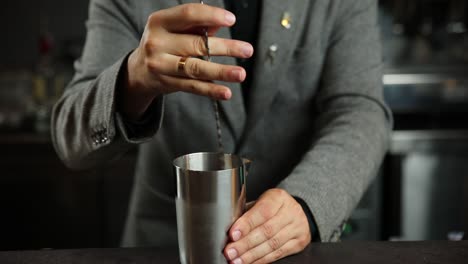 bartender mixing a cocktail