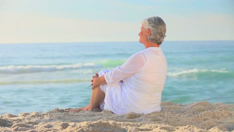 mature woman looking at the sea