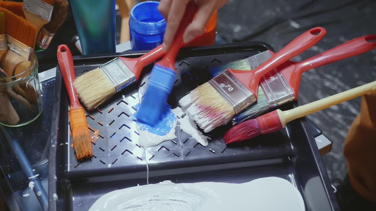 Artist mixing paint