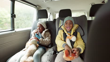 car, travel and children in back seat on road trip