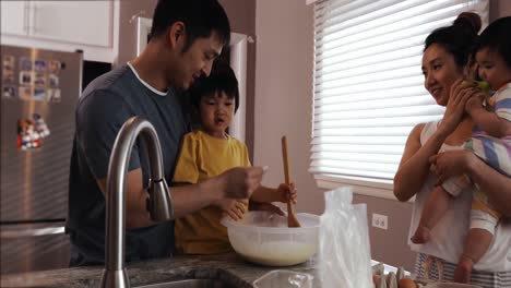 family enjoying time relaxing together at home