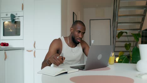 man working from home in the kitchen