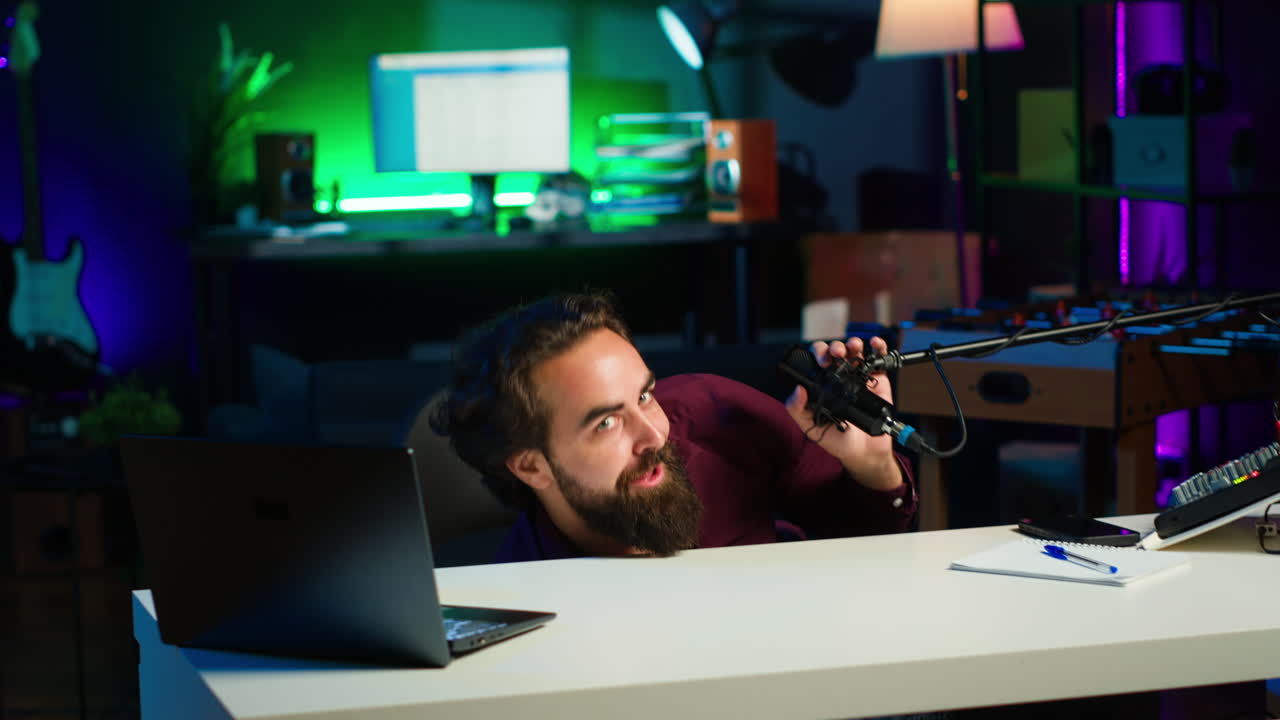 Playful internet star using microphone to shoot vlog