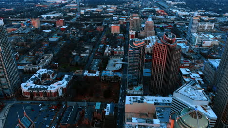 flying over the beautiful modern buildings in the scenery of chicago, illinois, the usa. glass and concrete downtown of metropolis on sunny daytime