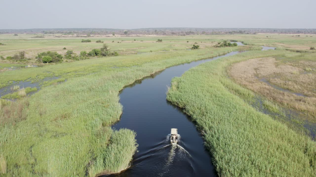 Aerial View as Passenger Boat Cruises Up Cuando River in Caprivi Strip, Africa
