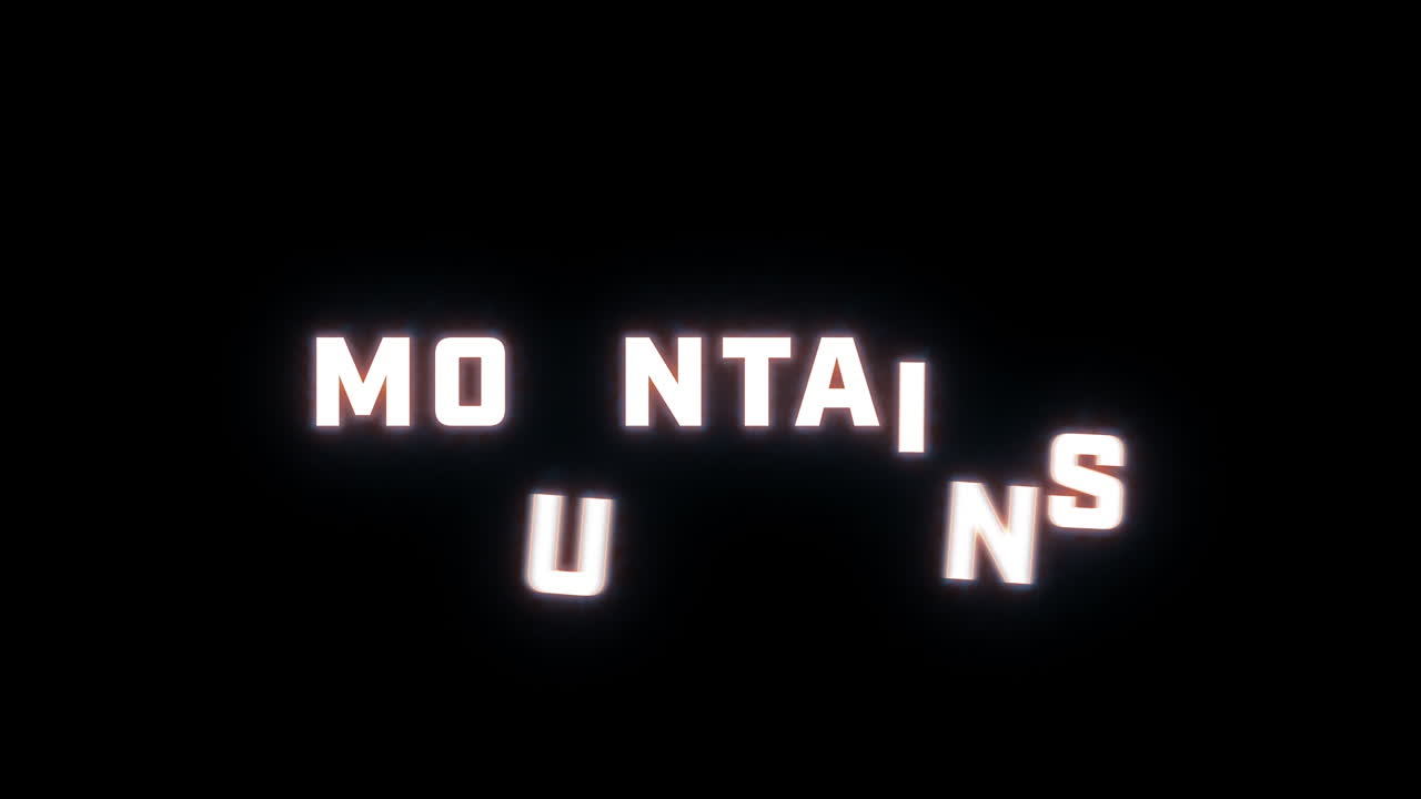 revelación de texto de 4k de la palabra "montañas" en un fondo negro