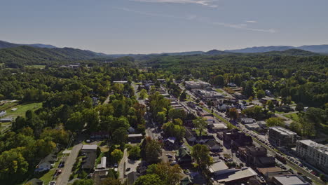 Blue-Ridge-Georgia-Aerial-v2-drone-flyover-the-center-of-charming-mountain-town-capturing-leafy-street-views-surrounded-by-scenic-mountainscape-on-a-sunny-day---Shot-with-Mavic-3-Cine---October-2022
