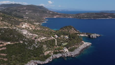 Drone-flight-along-rugged-Lefkada-coastline-towards-Kastri-beach,-near-Agiofili