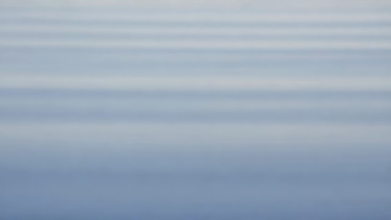 Impacting single droplet creating crown and jet, sending ripples at macro tank damping motion