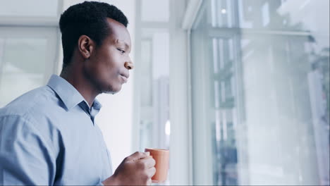 Window,-businessman-and-black-man-thinking