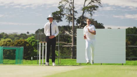 cricket player throwing a ball as far as possible