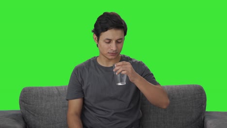 Indian-man-feeling-like-vomit-after-taking-medicine-Green-screen