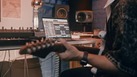 musician recording in home studio