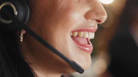 a woman wearing a headset provides customer service support in a call center environment