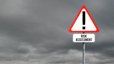 attention signboard post with risk assessment text against dark clouds in the sky