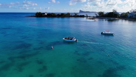 mauritius boat trip with gunners island view. turquoise waters, sunny day. concept of tropical vacation, leisure, travel. ideal for tourism, adventure, relaxation.